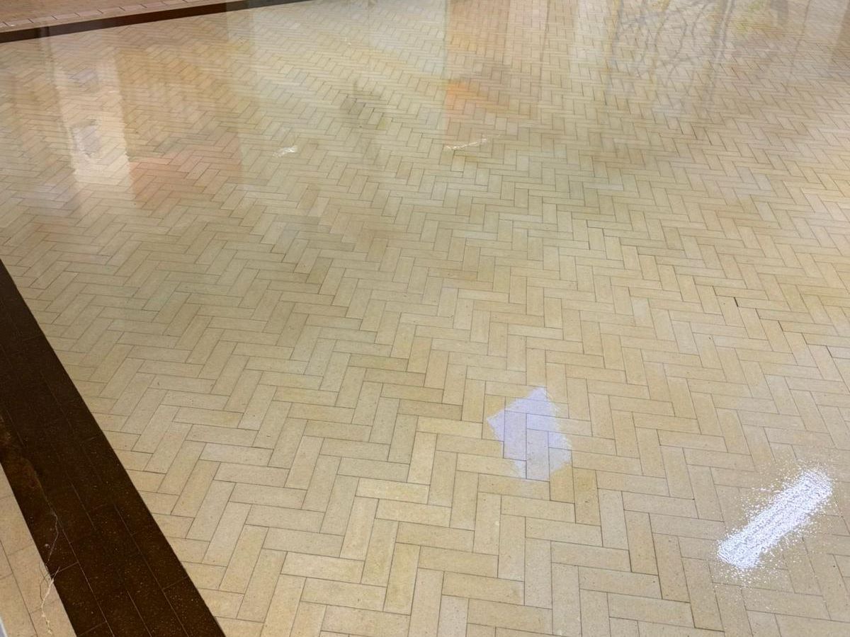 Close-up of a glossy herringbone Granwood block floor after sealing